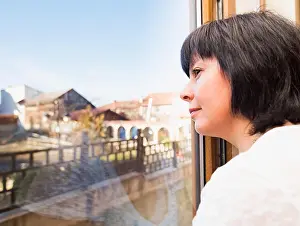 Windowsill Prints: brunette woman looking out the window