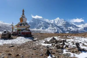 Himalayas Prints: A Buddhist stupa high in the mountains with the Annapurna range behind
