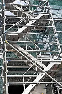 Gold Coast Prints: Building construction showing scaffolding access stairs and protective netting