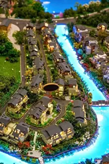 Proportion Prints: Building sand table model in real estate sales department