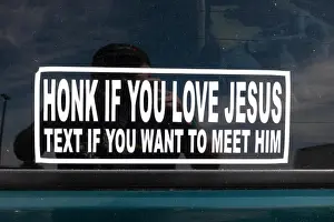 Texting Prints: Bumper sticker on car warning drivers not to text and drive