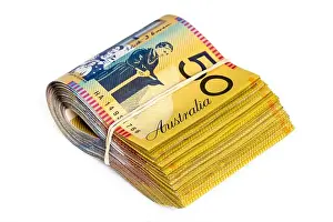 Over White Prints: Bundle of Australian money. Fifty dollar bills. Isolated on white