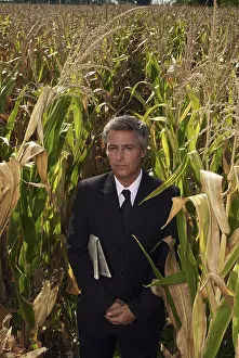 Posed Prints: A business man in a corn field