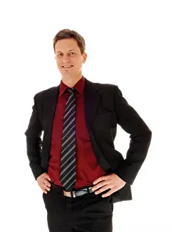 Formalwear Prints: An business man in a suit standing isolated for white background with his hands on his hips and smiling