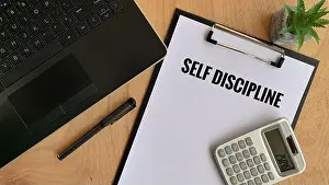 Entrepreneurship Prints: Business motivational words - Self Discipline on a piece of paper