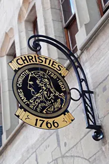 Shop Prints: Business sign on the facade of the Geneva branch of Christie's auction house