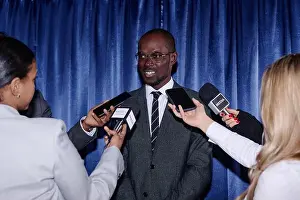 Journalist Prints: Businessman presenting at press conference and giving an interview to journalists