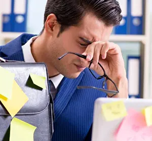 Hardworking Prints: The businessman with reminder notes in multitasking concept