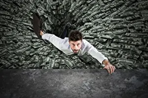 Helpless Prints: Businessman swallowed by black hole of money