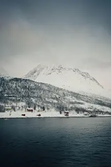 Brim Prints: Cabins in the snow by the arctic ocean in the Lyngen Alps in arctic Norway