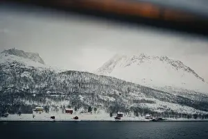 Brim Prints: Cabins in winter in the snowy Lyngen Alps by the arctic ocean in Norway
