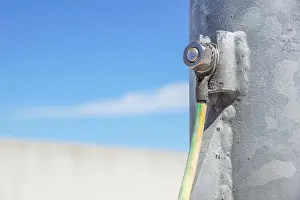 Electrician Prints: Cables connected to electrical grounding bar.Electric grounding