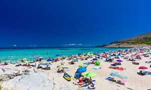 Mesquida Prints: CALA MESQUIDA, MALLORCA, SPAIN - 19 July 2020: People enjoying beautiful sandy beach of on Mallorca