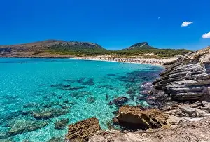 Mesquida Prints: CALA MESQUIDA, MALLORCA, SPAIN - 19 July 2020: People enjoying beautiful sandy beach of on Mallorca