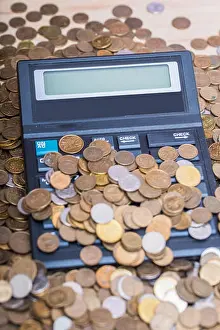 Accountant Prints: calculator and a stack of coins - Polish currency zloty