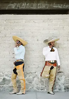Cell Phone Prints: The Calling - Mexican cowboys talk on cell phones outside the bullring in Ajijic
