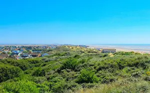 Foreshore Prints: Camber Sands beach and village at nice summer day seen from the dunes above looking north