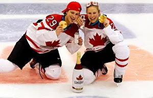 Ice Hockey Prints: Canadian team players Marie-Philip Poulin (L) and Tessa Bonhomme (R)