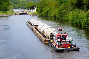 Commercial Prints: CANAJOHARIE, NY/USA - MAY 24 2017: Huge aluminum beer tanks made in China are shipped up the Erie Canal