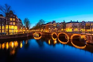 Canals of Amsterdam at night. Amsterdam is the capital and most populous city of the Netherlands
