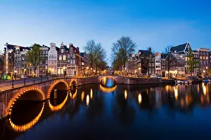 Canals of Amsterdam at night. Amsterdam is the capital and most populous city of the Netherlands