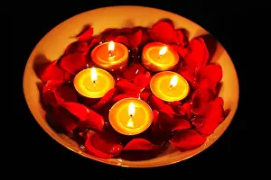Lamps Prints: Candle lights in a bowl with red rose petals