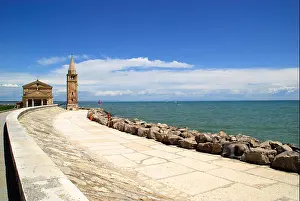 Seafront Prints: Caorle, Veneto, Italy. The Church of Blessed Virgin of the Angel is built on a little promontory on the sea