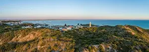 South Australia Prints: Cape Martin Lighthouse at sunset. Beachport, South Australia - wide aerial panorama