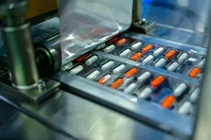 Medicament Prints: Capsule medicine pills during production line and packing process on modern pharmaceutical factory