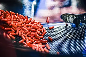 Capsules Prints: capsule tablet production line in pharmaceutical factory