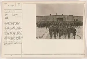 Caption: The photograph shows the personnel of the Q