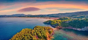 Captivating sunset on Saint Basil Beach with Agkali village on background