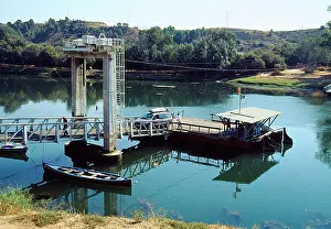 River Bank Prints: Car ferry over river Ebro. Flix, Tarragona province, Catalonia, Spain