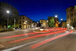 Images Dated 8th July 2017: Car light trails on the crossroad during night in the city of Umbertide, Italy