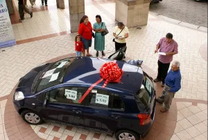 Middle Class Prints: Car being raffled at Metrocentro