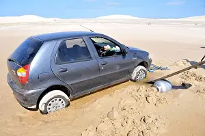 Lever Prints: Car stuck in quicksand being rescued