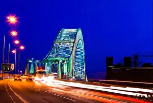 Traffic Light Prints: Car traffic light trails crossing The Silver Jubilee Bridge