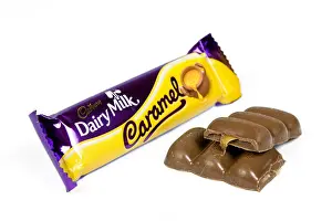 Temptation Prints: Caramel chocolate bar on white background with open cut up bar by the side