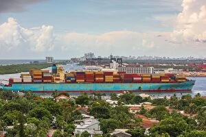 Images Dated 15th July 2017: A cargo ship passes through the rivers of Ft. Lauderdale, Florida, USA