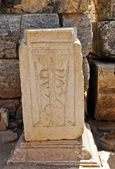 Cyclades Prints: Carving of a snake and lion legged stand at UNESCO World Heritage Archaeological Site