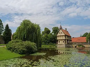 Castle with half-timbered architecture and red tiled roof