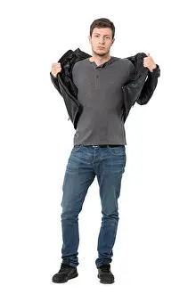 Sneakers Prints: Casual man taking off jacket looking at camera
