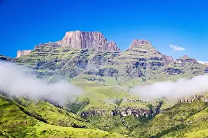 Drakensberg Prints: Cathkin Peak, Monk's Cowl and Champagne Castle on a sunny day and a blue sky