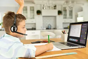 Communication Technology Prints: Caucasian boy raising hand for video call