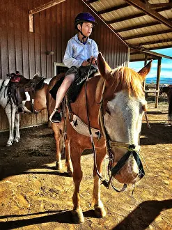 Pre Adolescent Prints: Caucasian boy riding horse