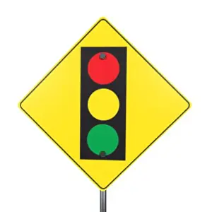 Modern Design Prints: A caution sign featuring a traffic light symbol with red, yellow, and green circles