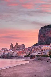 Cefalu, Sicily, Italy. Cityscape image if coastal town Cefalu in Sicily at dramatic sunrise