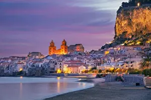 Cefalu, Sicily, Italy. Cityscape image if coastal town Cefalu in Sicily at dramatic sunrise