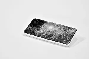 Desperate Prints: Cell phone with the screen broken by a hammer