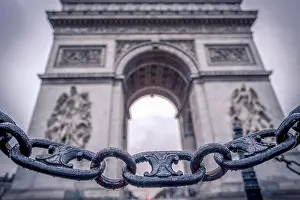 Prohibited Prints: Chain links and the Arc de Triomphe in the background
